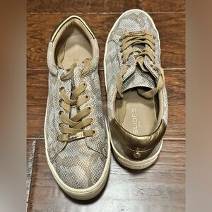 JSlides animal print sneakers.